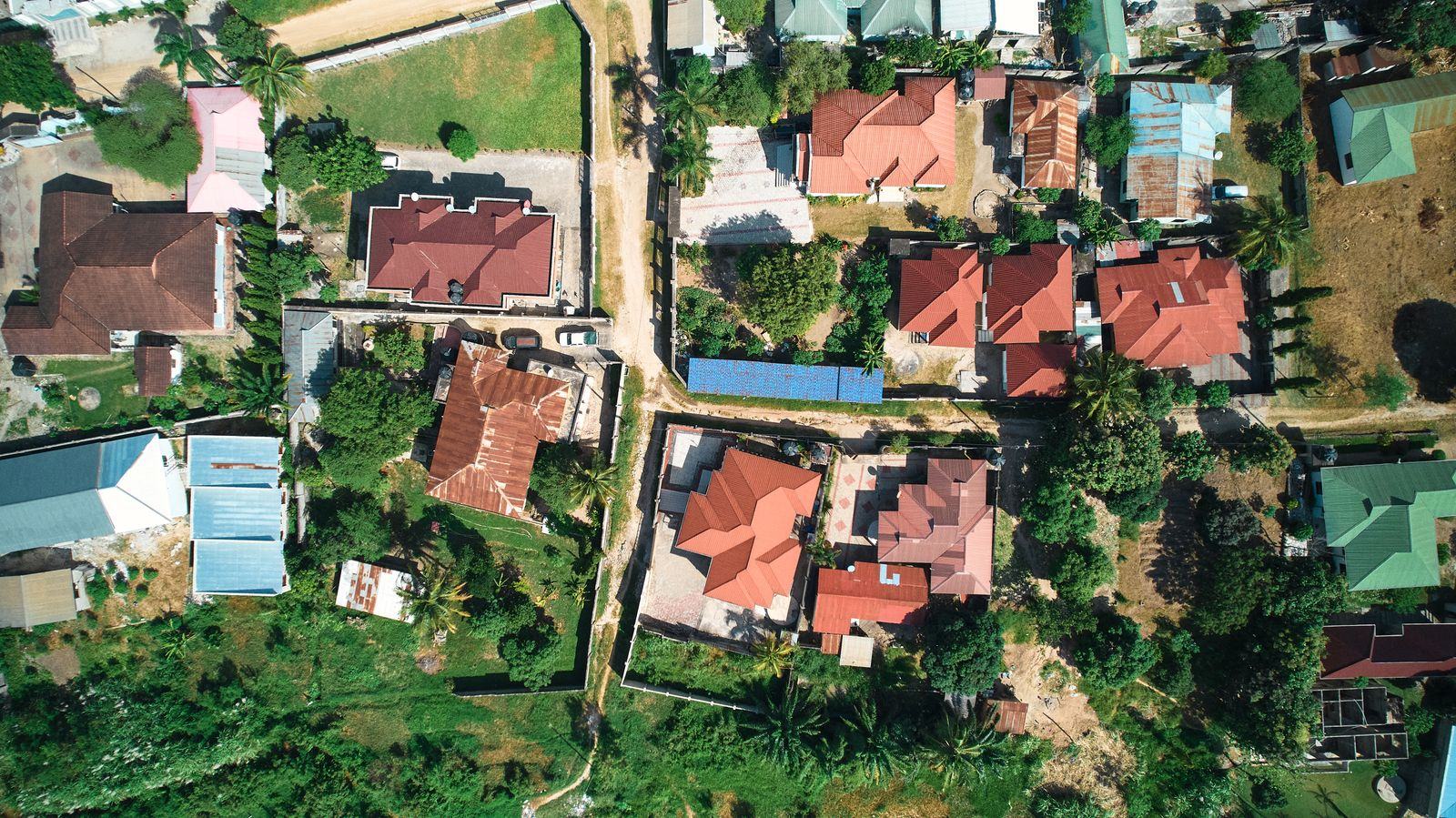 Aerial view of neighbourhood houses with gardens