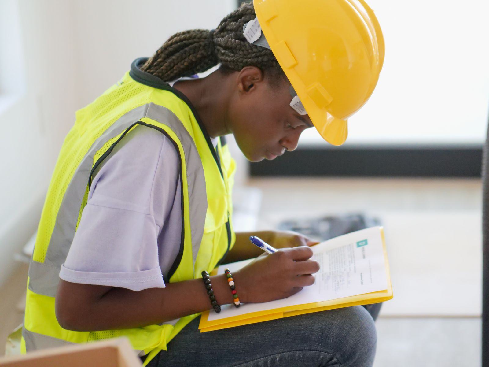 Engineer reviewing a checklist on a clipboard