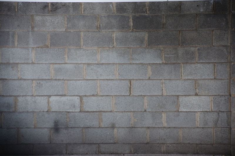 Close view of a grey concrete block wall
