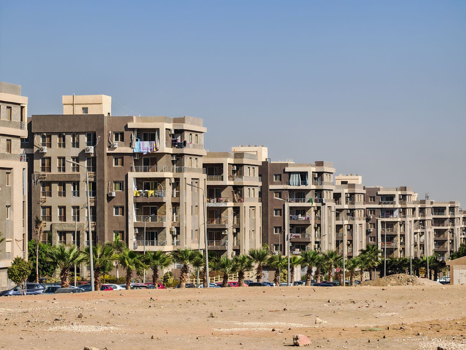 Apartment buildings under a clear sky