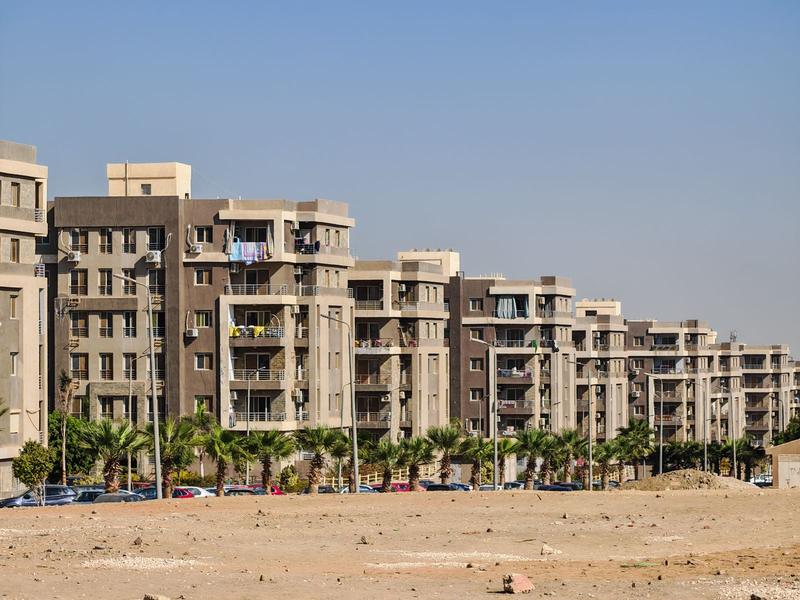 Apartment buildings under a clear sky