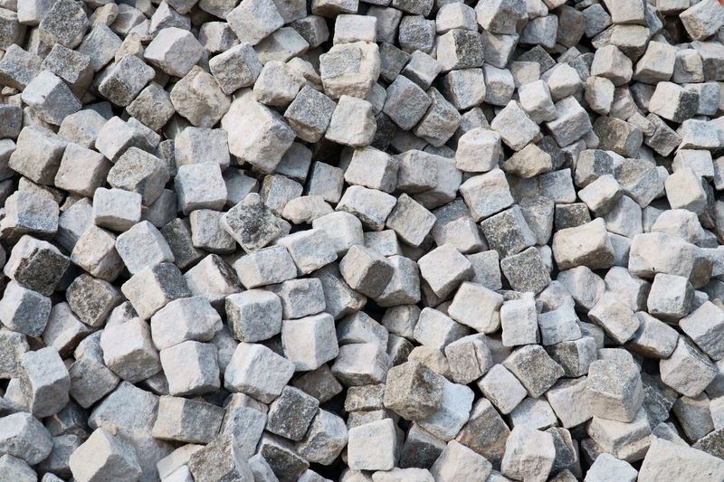 Heap of gray stone cubes