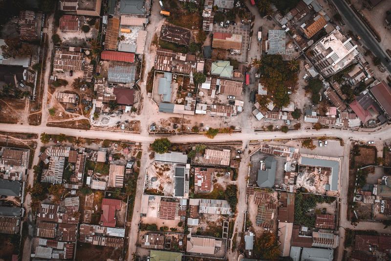 Drone shot of urban streets and buildings in Dar es Salaam, Tanzania