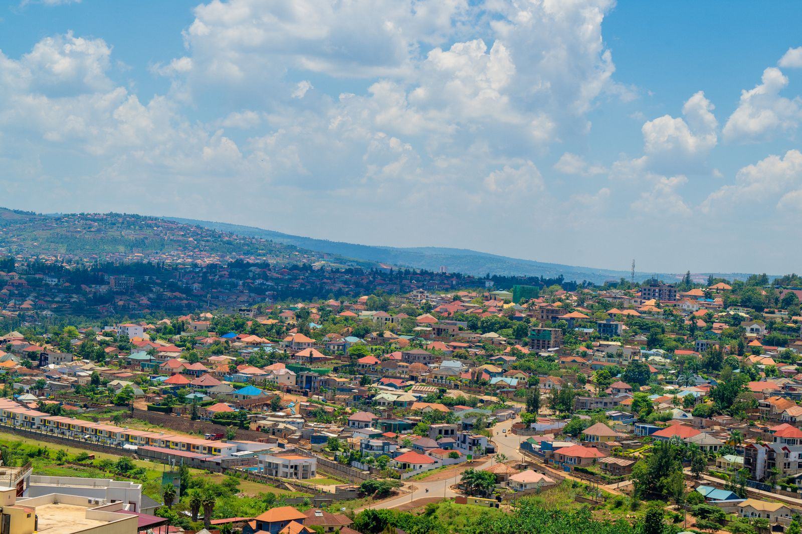Aerial view of a hillside town with many houses