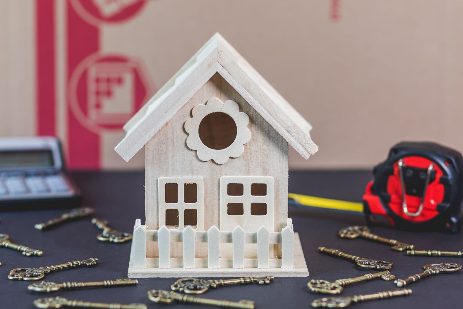 Model house and keys on a table