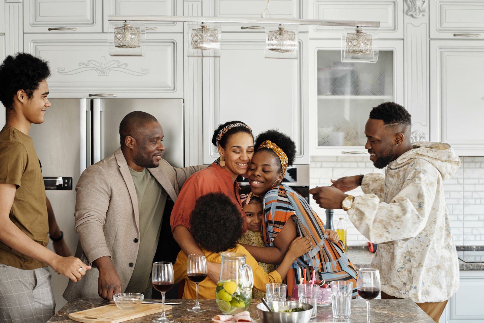 Family preparing a meal together in a kitchen