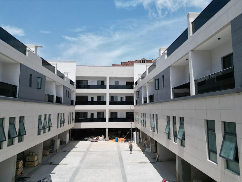 Modern apartment building with balconies around a courtyard