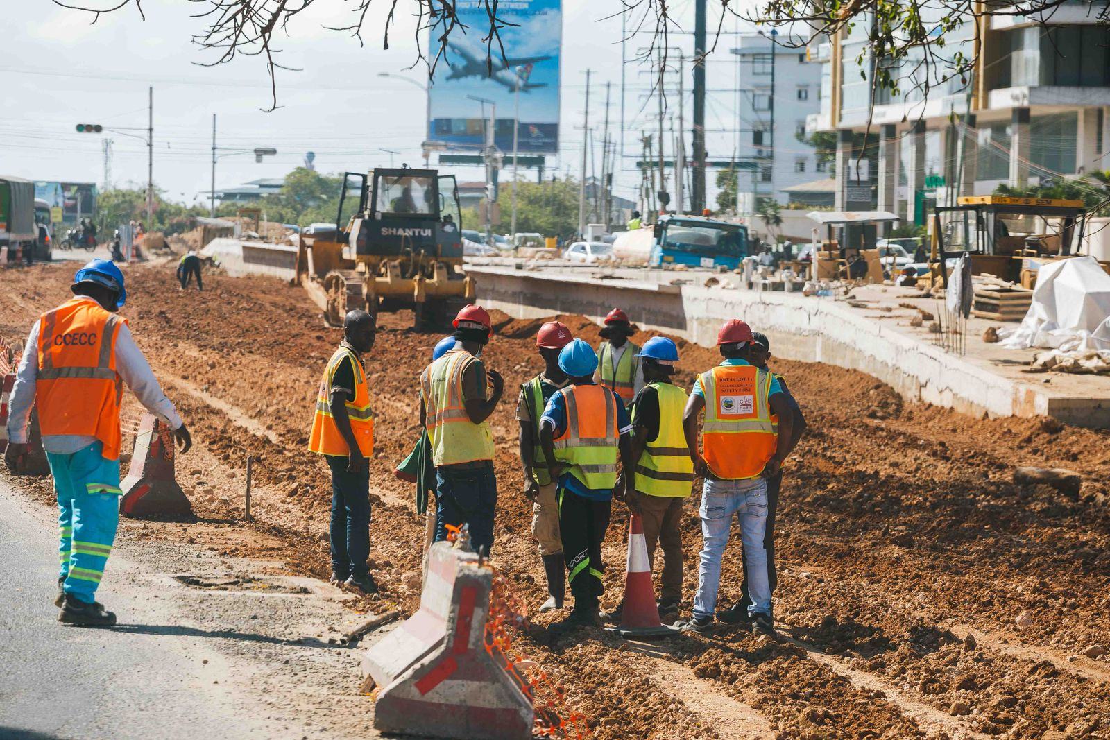 Road construction crew working on a city road